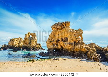 Rocks In Blue Ocean In Sunny Day, Algrave, Portugal