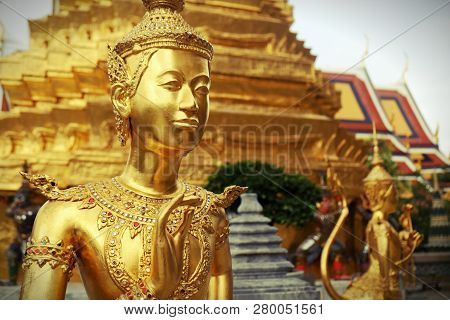 Golden Kinnari Statue At Temple Of Emerald Buddha (wat Phra Kaew