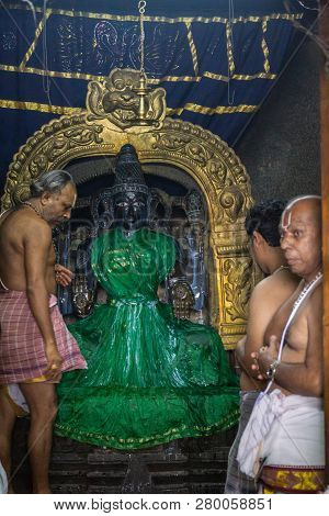 Belur, Karnataka, India - November 2, 2013: Chennakeshava Temple. Half Naked Priests Stand Around We