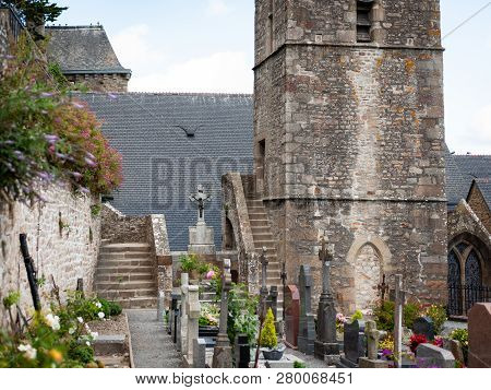 Catholic Church Église Saint-pierre And Cemetery In Le Mont Saint Michelle (normandy, France)