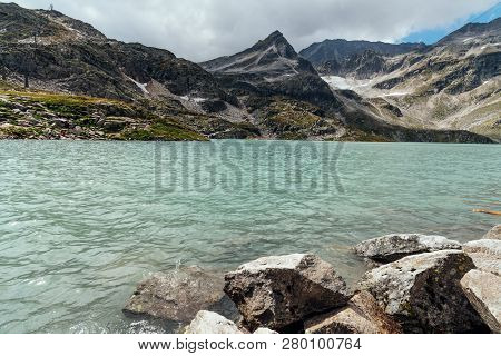 Scenic View Of Weissee Lake In Alps