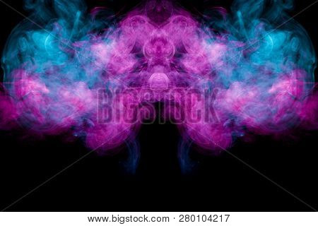 Thick Colorful Smoke Of Blue, Pink And Red  In The Form Of A Skull, Monster, Dragon On A Black Isola
