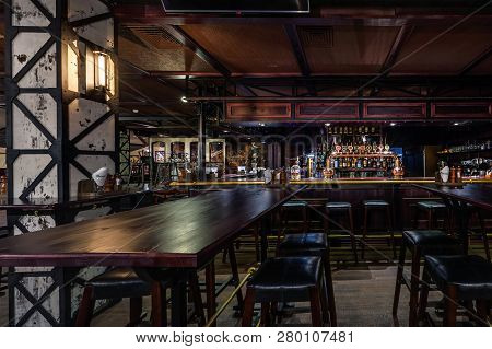 Grodno, Belarus - December, 2018: Inside Interior In Modern Pub Restaurant With Dark Loft Design Sty