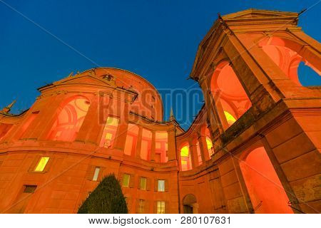 Bottom View Of Sanctuary Of Madonna Di San Luca Basilica Church Illuminated At Evening. Cathedral Of