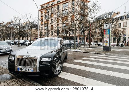 Strasbourg, France - Mar 18, 2018: Wide Image Of Luxury Rolls-royce Limousine Black Silver Car On Fr