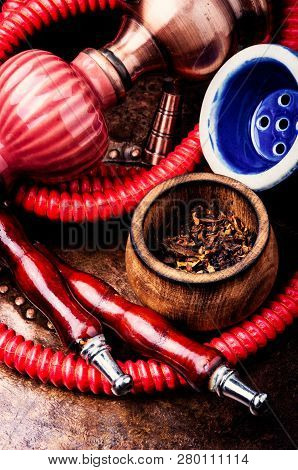 Smoking Hookah With Tobacco