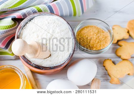 Easter Cooking Background, Dough And Indredients, Cuts For Cookies And Colored Sugar Décor For Bakin