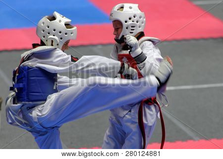 ST. PETERSBURG, RUSSIA - OCTOBER 17, 2015: Unidentified athletes compete in the individual taekwondo tournament during the martial arts festival Baltic Sea Cup in Sibur Arena