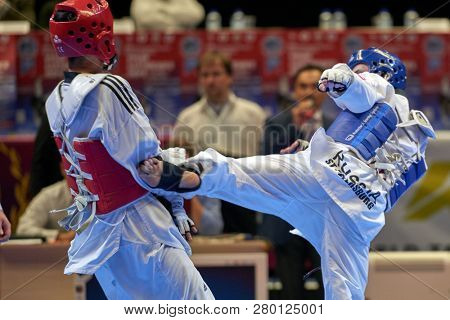ST. PETERSBURG, RUSSIA - OCTOBER 17, 2015: Taekwondo WTF junior teams match Russia vs Iran during the martial arts festival Baltic Sea Cup in Sibur Arena