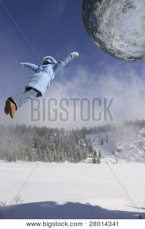 Ragazza sorvolano su un pianeta foresta d'inverno