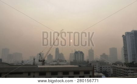 Sukhumvit area in Bangkok city covered by smog and pollution. Thailand.