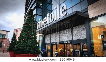 Strasbourg, France - December 28, 2017 - People Walking In Front Of Rivetoile Shopping Center Decora