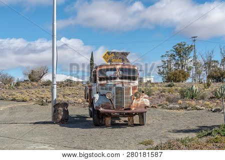 Fraserburg, South Africa, August 7, 2018: A Street Scene, With A Vintage Truck Used As Advertisement
