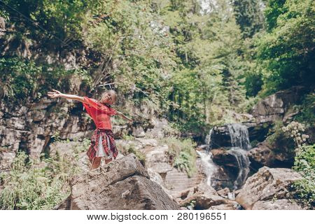 Little Girl Enjoying View Of Waterfall In Krasnay Poliana