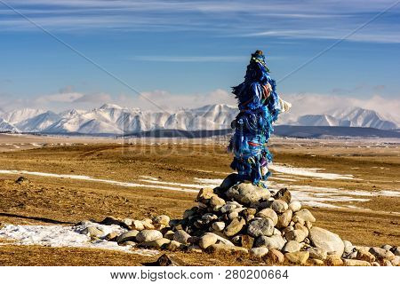 Sacred Place With Obo. Winter Landscape Of Mongolia. Lake Khubsugul And Mountain