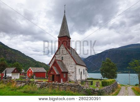 12th century Romanesque Gothic Dale Church in Luster village on the Lustrafjord (Lustrafjorden) fjord, branch of greater Sognefjord (Sognefjorden), Luster municipality, Sogn og Fjordane, Norway