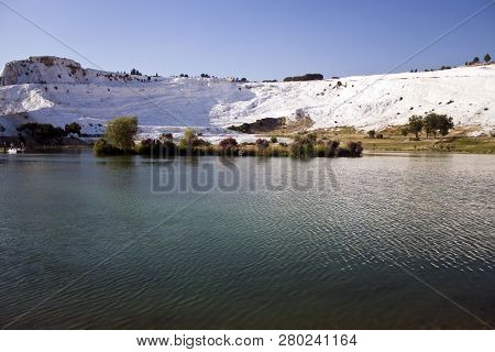 Lake And Travertine Terraces In Pamukkale, Turkey