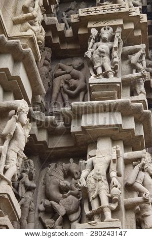 Detail Of An Erotic Kama Sutra Carving On A Temple In Khajuraho, Madhya Pradesh, India.