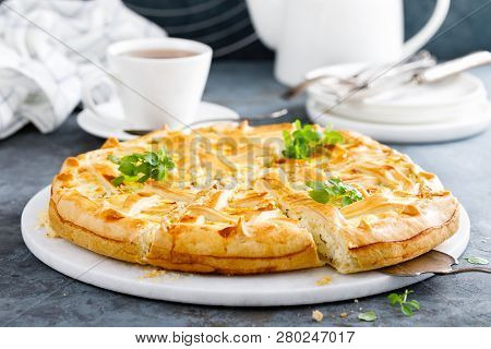 Pie With Salted Soft Cheese And Greens