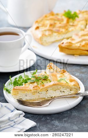 Pie With Salted Soft Cheese And Greens