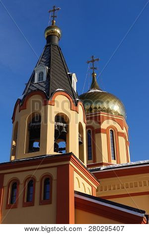 White Orthodox Church Against The Blue Sky