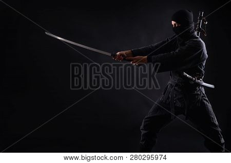 Ninja, Samurai Warrior On A Dark Background