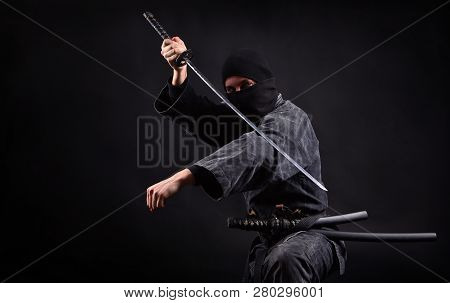 Ninja Samurai With Katana In Attack Pose