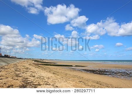 Sandy Beach On The Coast Of Normandy, France