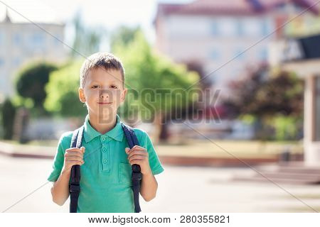 Child With School Bag. Kid Outdoors. Back To School Concept.
