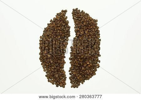 Roasted Coffee Beans Poured In The Form Of Coffee Beans
