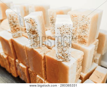 Bars Of Soap On A Shop Window. Ylang-ylang Soap With Natural Cedar Oil And Herbal Ingredients. Handm