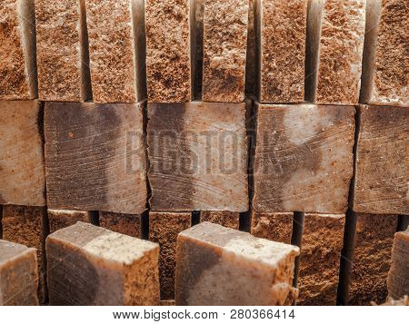 Bars Of Soap On A Shop Window. Cinnamon Soap With Natural Cedar Oil And Herbal Ingredients. Handmade