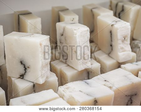Bars Of Soap On A Shop Window. Pure Natural Soap With Cedar Oil And Herbal Ingredients. Handmade Nat