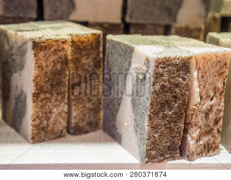 Bars Of Soap On A Shop Window. Cinnamon Soap With Natural Cedar Oil And Herbal Ingredients. Handmade