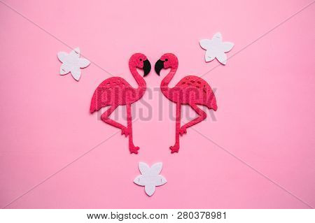 Two Red Flamingos On A Pink Background In Minimal Style.