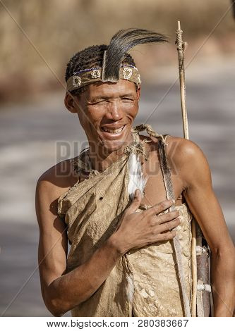 Erindi, Namibia - July 19, 2018: A Native Bushman Gives A Farewell Dance To Wish Good Hunting To The
