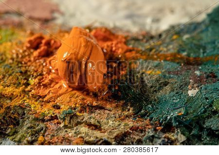 Oil Art Paints On A Very Old Palette. Close-up