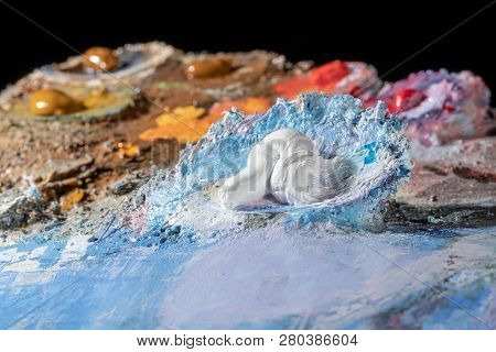Oil Art Paints On A Very Old Palette. Close-up