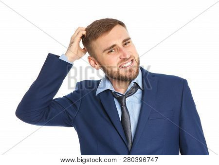 Young Man Scratching Head On White Background. Annoying Itch