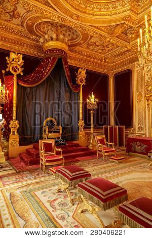 Paris, France, March 31, 2017: Fontainebleau Palace interiors. The Throne Room. Chateau was one of the main palaces of French kings