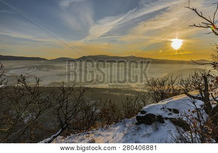 Sunrise On Boren Hill Near Bilina Town In Winter Frosty Color Morning