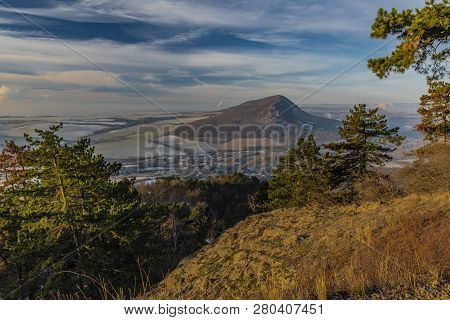 Sunrise On Boren Hill Near Bilina Town In Winter Frosty Color Morning With Pine Tree