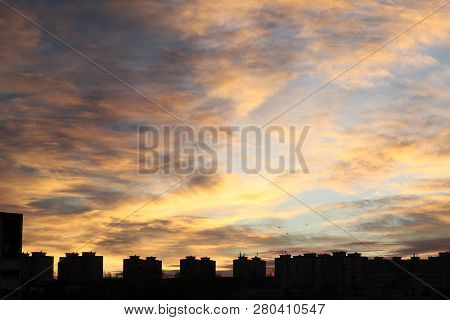 Colors And Lights Of The Sun Reise On The Sky  Above The City