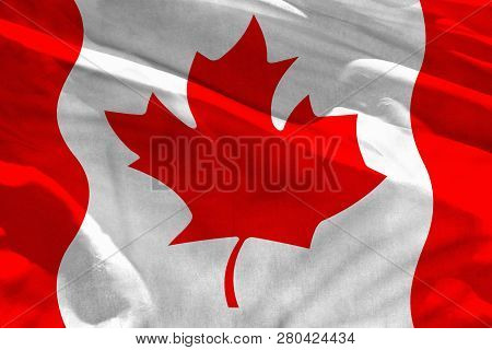 Fluttering Canada Flag For Using As Texture Or Background, The Flag Is Waving On The Wind