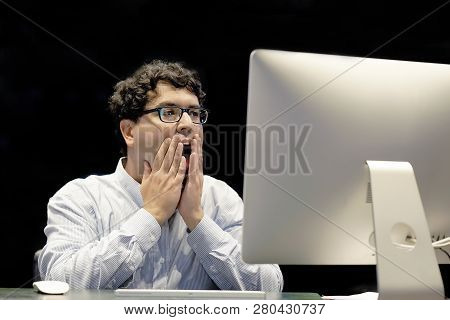 Male Office Worker In Front Of A Computer Made A Mistake In The Calculation. Stress, Fright, Facial 