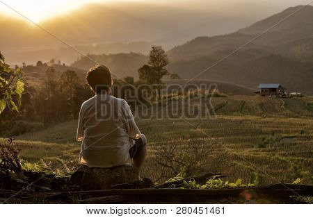 The Back Of Senior Woman Watching The View Rice Field Near Mountain At Mae Chaem, Chiang Mai In Time