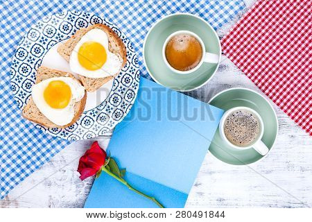 Flowers, Two Cups Of Aromatic Coffee And Heart-shaped Toasts For A Romantic Morning Of Lovers. Red R