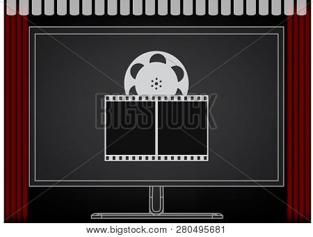 Movie Wheel And Film Strip On The Monitor On A Black Background