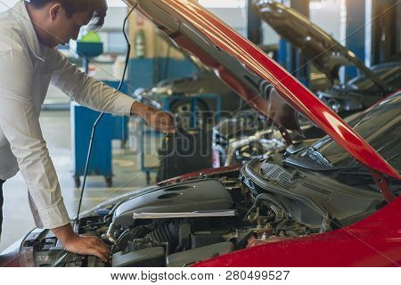 This Career Man Saleman Business Inspection Writing Note On Notepad Or Book, Paper With Car Blurry B