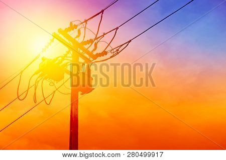Silhouette Block Recloser,sunset Electric Wire On The Pole In The Evening